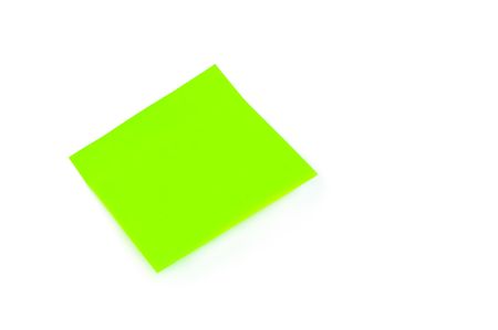 Green post-it isolated on the white backgroundの写真素材