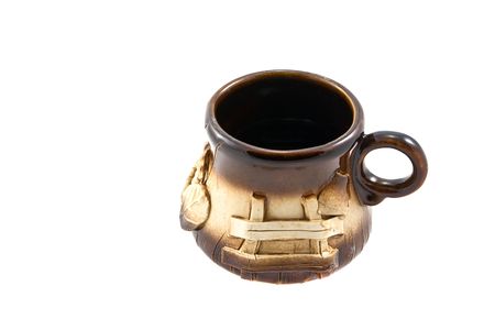 Clay cup for coffee on the whiteの写真素材