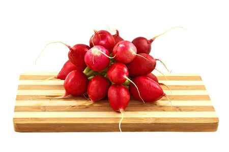 Fresh radish  on the wooden striped deskの写真素材