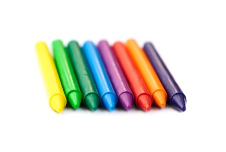 Multi-colored wax crayons isolated on white backgroundの写真素材
