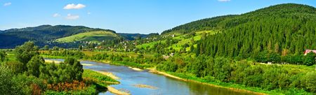Carpathian mountain summer landscape with river, sky and clouds Carpathian mountain summer landscape with river, sky and clouds