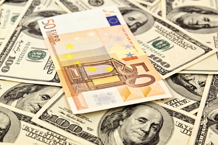 Dollars backround with euroの写真素材