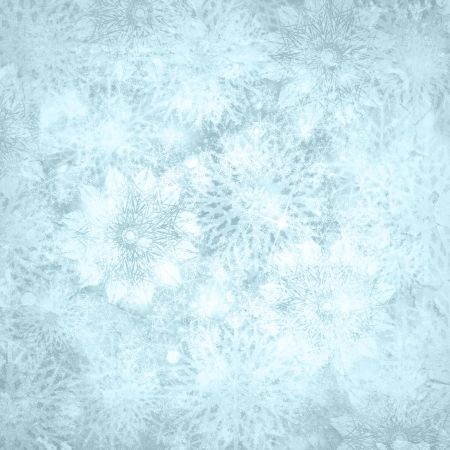 Christmas shiny textured  snow background with snowflakes and copy space in blue silver colorsの写真素材