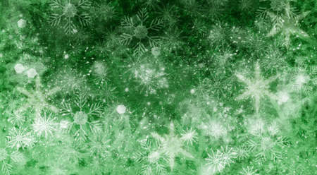 Christmas shiny textured  snow background with snowflakes and copy space in green colorsの写真素材