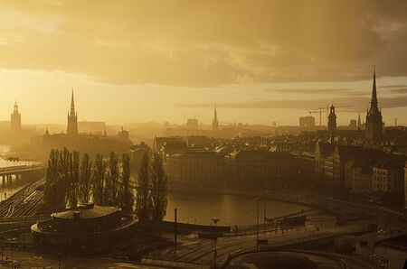 Beautiful sunset with rainbow and dark blue sky over the Stockholm - the capital of Swedenの写真素材