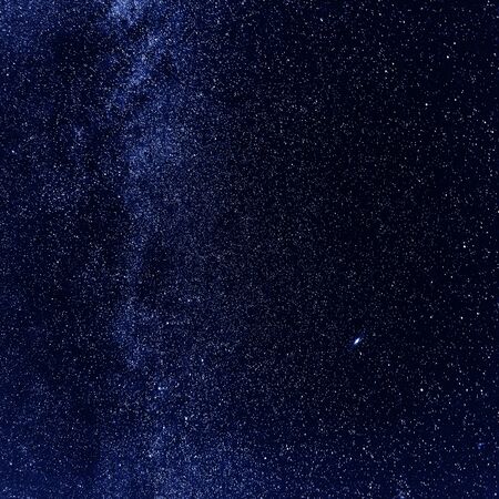 Night sky with lot of shiny stars, natural abstract astro square background with copy spaceの写真素材