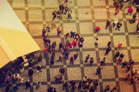 Top view from the Prague City Hall to the square with a lot of small tourist people, european...