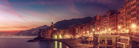 Beautiful Small Mediterranean City at sunset with colorful sky - Camogli, Italy, European travelの写真素材