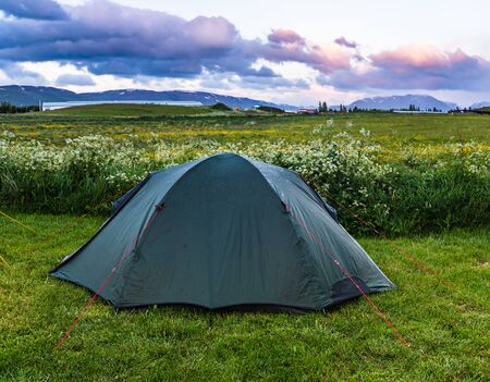 Green tent on the camping in Iceland, travel outdoor summer backgroundの写真素材