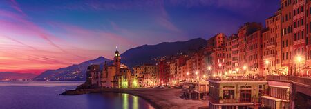 Beautiful Small Mediterranean City at sunset with colorful sky - Camogli, Italy, European travelの写真素材