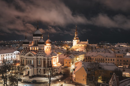Aerial night View of Tallinn in winter with Alexander Nevsky Cathedral, roofs with snow, Christmas moodの写真素材