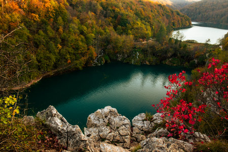 Autumn colors and lake of Plitvice National Park in Croatia, seasonal colorful background