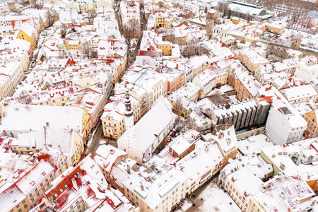 Aerial View of Tallinn in winter, roofs are covered with snow, Christmas moodの写真素材