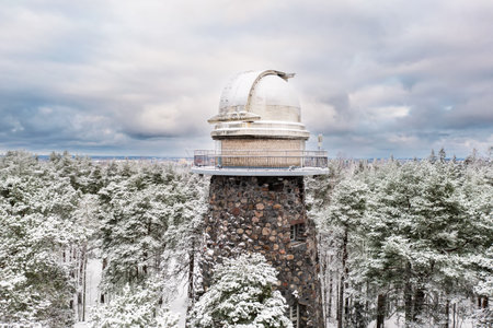 Old observatory tower in the Glen park. Tallinn, Estonia, against dramatic skyの写真素材