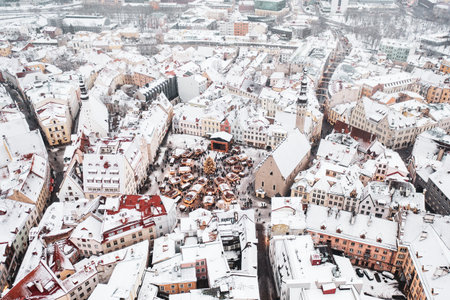 Aerial View of Tallinn with the Town Hall Square in winter, roofs with snow, Christmas moodの写真素材