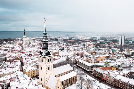 Aerial View of Tallinn in winter, roofs are covered with snow, Christmas moodの写真素材