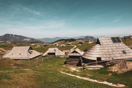 Mountain village in Alps, wooden houses in traditional style, Velika Planina, Kamnik, Sloveniaの写真素材
