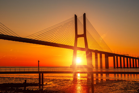 Vasco da Gama road bridge in Portuguese capital Lisbon at sunrise.の写真素材