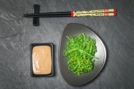 Japanese Cuisine - Chuka Seaweed Salad. Served with Nuts Sauce. Top viewの写真素材