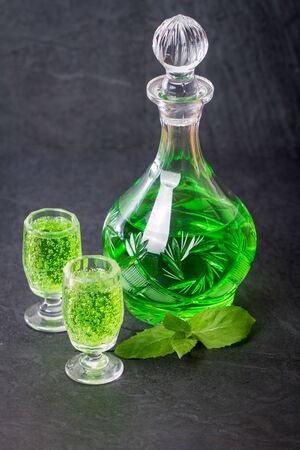 Green drink with soda, tarragon and mint, selective focusの写真素材