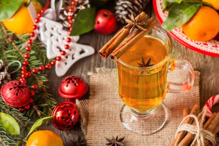 Traditional winter mulled wine and christmas ornamentの写真素材