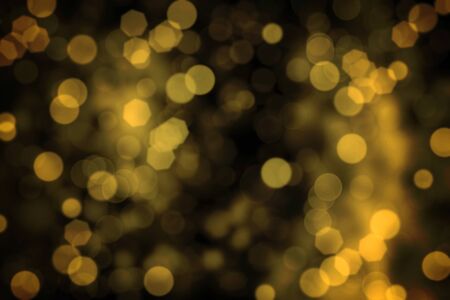 Golden blur bokeh light for happy new year backgroundの写真素材
