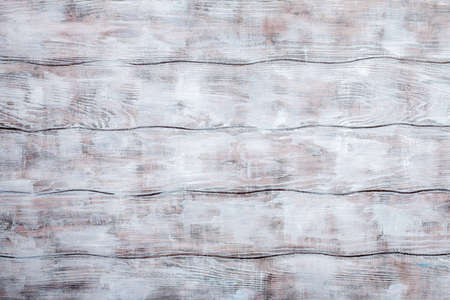 Vintage weathered shabby white painted wood texture as background.の写真素材
