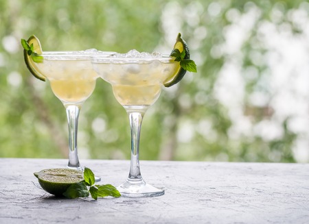 margarita cocktail with lime on nature backgroundの写真素材