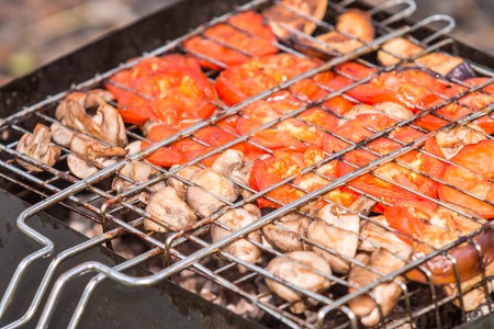 Delicious grilled vegetable over the coals on a barbecue outdoorの写真素材