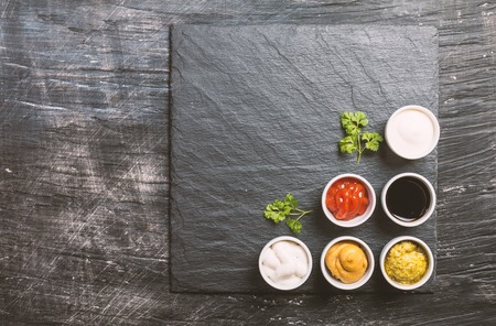 bowls of various dip saucesの写真素材