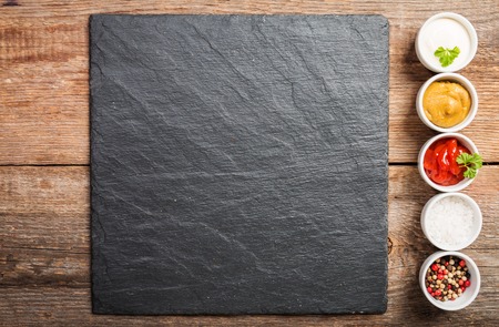 bowls of various dip saucesの写真素材