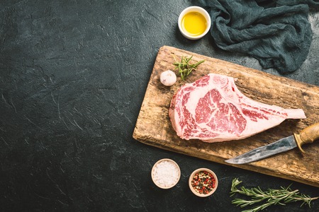 Raw tomahawk beef steakの写真素材