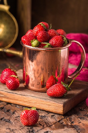 Fresh strawberries in a bowlの写真素材