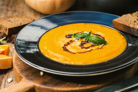 Pumpkin and carrot soupの写真素材