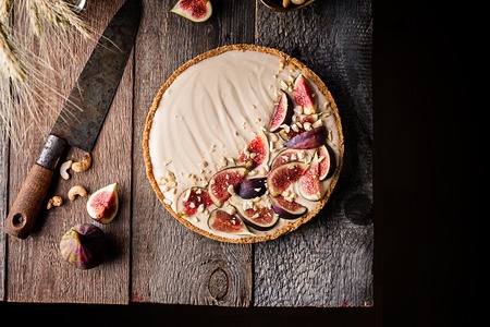 Delicious Tart with honey and mascarpone cheese cream and fresh figs, top viewの写真素材