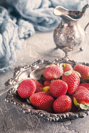 Bowl of strawberries, top viewの写真素材