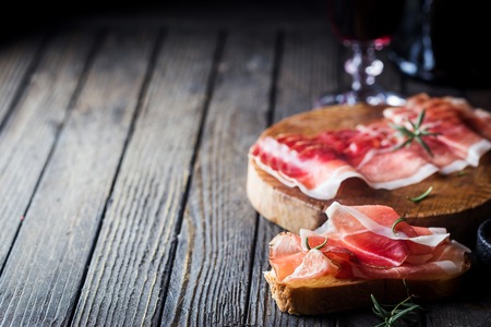 Open sandwich with prosciuttoの写真素材