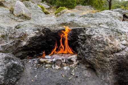 Yanartas burning stones is a geographical feature near the Olympos valley and national park in...