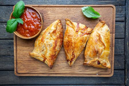 Asian food Samsa or samosas with chicken fillet on cutting board. Top viewの写真素材