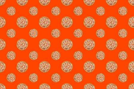Seamless pizza pattern on colorful bright background.の写真素材