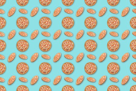 Seamless pizza pattern on colorful bright background.の写真素材