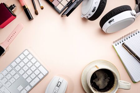 Flat lay or top view office table desk. Workspace with blank, keyboard, pen, green plant succulent,...