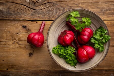 Red pickled garlicの写真素材