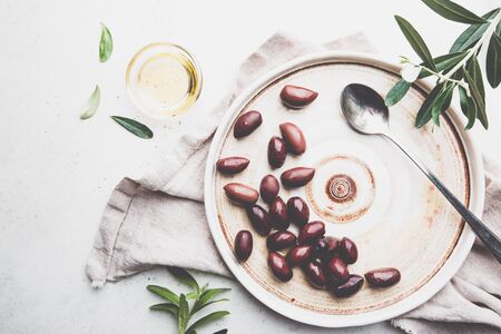 Black olives and olive oilの写真素材