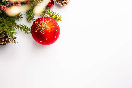 Christmas holidays composition with red balls on white background with copy space for your text