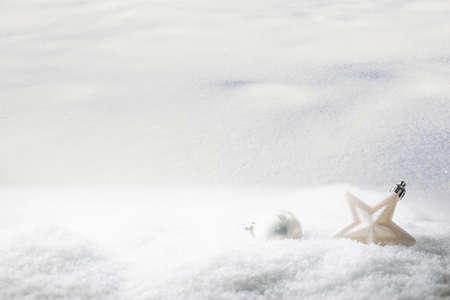 Christmas white decorations star and boll on snow. Winter Decoration Backgroundの写真素材