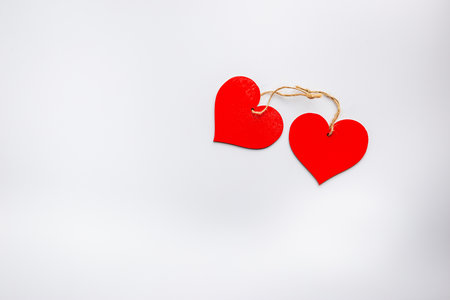 Red Heart shapes on abstract white background. Love concept for valentines day.の写真素材