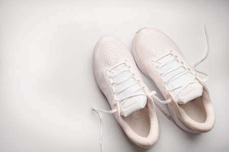 Flat lay sport with white sport shoes on white background. Concept healthy lifestyle, sport and dietの写真素材
