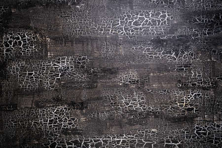 cracked black stone or concrete wall background