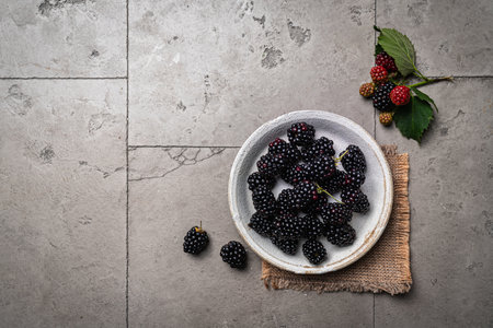 Ripe blackberries with leaves